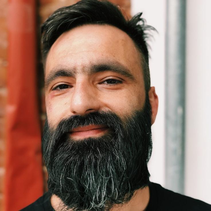 Kai Chen, Client Relations Director, discussing corporate gifting strategy with business clients